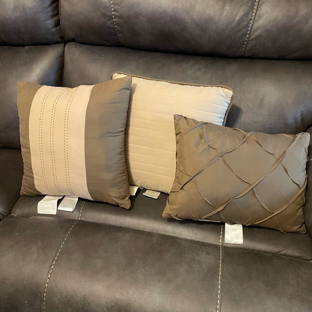 Gently used 3 decorative pillows